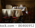 Unrecognisable interior of vintage cafe or restaurant with retro wooden furniture. Tourists retro style cafe as background 86466952
