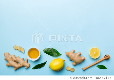 Natural cold and flu home remedies. Natural ingredients for immunity stimulation and viruses protection. top view flat lay Natural cold and flu home remedies. Natural ingredients for immunity stimulation and viruses protection. top view flat lay 86467177
