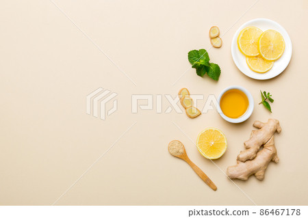 Natural cold and flu home remedies. Natural ingredients for immunity stimulation and viruses protection. top view flat lay Natural cold and flu home remedies. Natural ingredients for immunity stimulation and viruses protection. top view flat lay 86467178