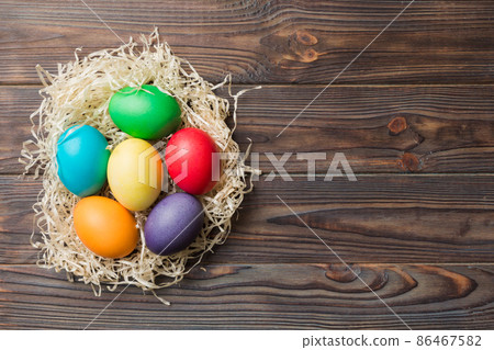 holiday preparation Multi colors Easter eggs on colored background . Pastel color Easter eggs. holiday concept with copy space holiday preparation Multi colors Easter eggs on colored background . Pastel color Easter eggs. holiday concept with copy space 86467582