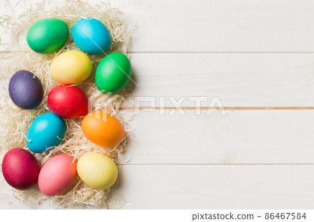 holiday preparation Multi colors Easter eggs on colored background . Pastel color Easter eggs. holiday concept with copy space holiday preparation Multi colors Easter eggs on colored background . Pastel color Easter eggs. holiday concept with copy space 86467584