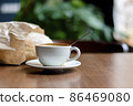 Cup of coffee latte on in a cafe on a wooden table 86469080