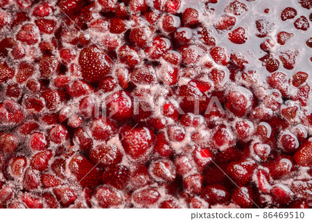Boiling Homemade Strawberry jam. 86469510