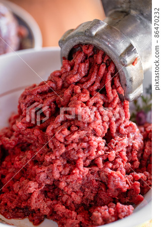 Minced beef meat for cooking burgers macro 86470232