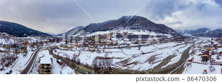 Aerial panorama of Mestia georgian village in winter Aerial panorama of Mestia georgian village in winter 86470306