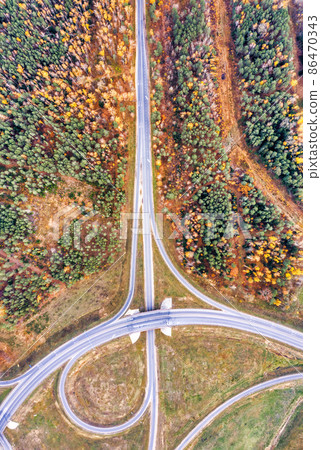 Aerial view on autumn road with intersection 86470343