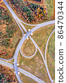 Aerial view on circular road intersection autumn landscape 86470344