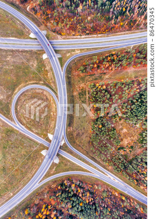 Aerial view on a circular road intersection Aerial view on a circular road intersection 86470345