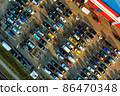 Aerial of full carpark near supermarket 86470348
