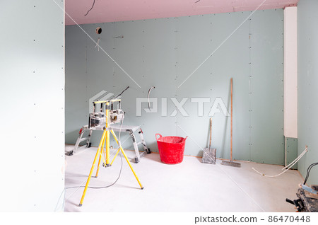 Freshly Plastered Walls in Room 86470448