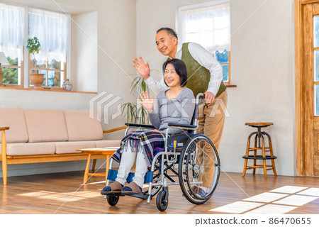 Rehabilitation center waving couple 86470655