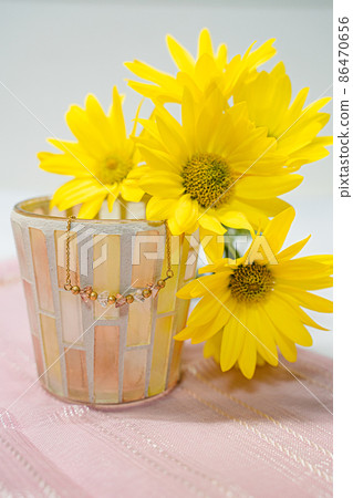 Gerbera and fashionable necklace wallpaper 86470656