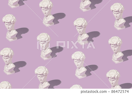 Background pattern of white Grecian or Roman busts 86472574