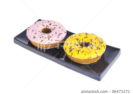 Sweet tasty donuts with colorful icing. Sweet tasty donuts with colorful icing. 86473272