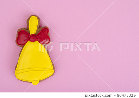 Homemade gingerbread with icing in shape of bells. Homemade gingerbread with icing in shape of bells. 86473329