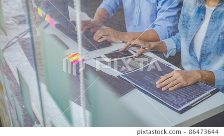 Programmer working in a software development and coding technologies. Website design. Technology concept. Programmer working in a software development and coding technologies. Website design. Technology concept. 86473644