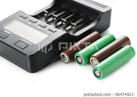 electronic charger with batteries close-up electronic charger with batteries close-up 86474921