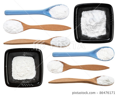 top view of baking powder in black bowl isolated 86476171