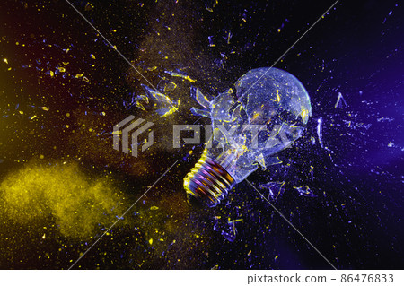 broken light bulb on black. broken light bulb on black. 86476833