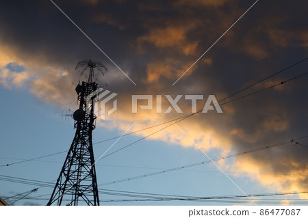 Tower and sunset clouds 86477087