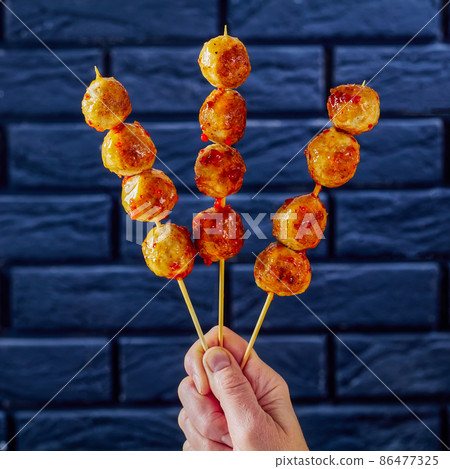 Luk Chin Ping, thai meatball skewers, top view Luk Chin Ping, thai meatball skewers, top view 86477325