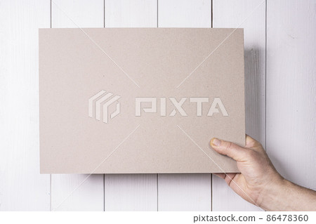 a cardboard sign a cardboard sign 86478360