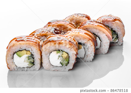 Traditional delicious fresh sushi roll set on a white background Traditional delicious fresh sushi roll set on a white background 86478518
