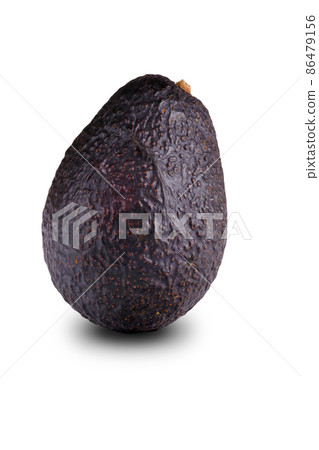 Ripe fresh avocado isolated on white background.  86479156