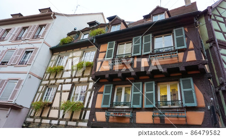 Colmar, Petit Venice, traditional half timbered colorful houses at winter Colmar, Petit Venice, traditional half timbered colorful houses at winter 86479582