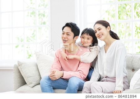 Happy family relaxing on the sofa Happy family relaxing on the sofa 86481894