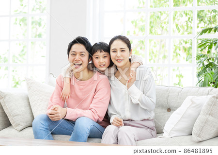 Happy family relaxing on the sofa Happy family relaxing on the sofa 86481895