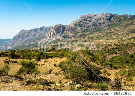 View of Rocche del Crasto near Alcara Li Fusi town in the Nebrodi Park, Sicily View of Rocche del Crasto near Alcara Li Fusi town in the Nebrodi Park, Sicily 86482955