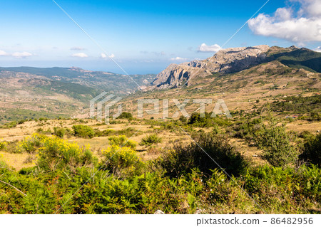 View of Rocche del Crasto near Alcara Li Fusi town in the Nebrodi Park, Sicily View of Rocche del Crasto near Alcara Li Fusi town in the Nebrodi Park, Sicily 86482956