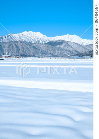 Winter Northern Alps seen from Omachi City (Jiigatake / Kashimayarigadake) Winter Northern Alps seen from Omachi City (Jiigatake / Kashimayarigadake) 86484667