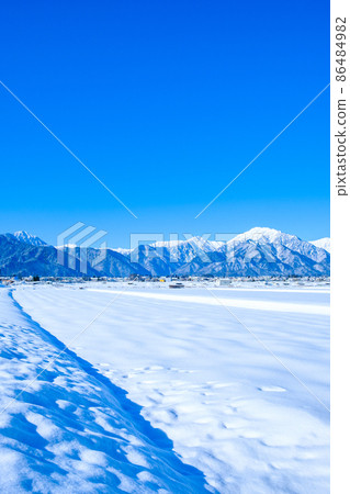 Winter Northern Alps seen from Omachi City Winter Northern Alps seen from Omachi City 86484982