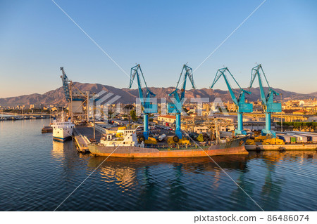 Port cargo cranes in Palermo 86486074