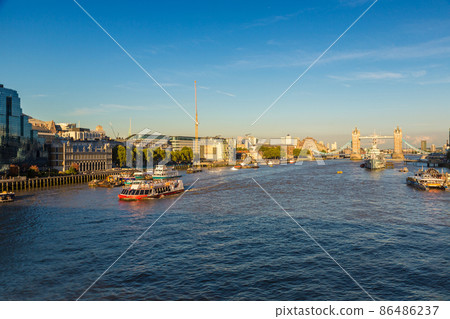 Tower Bridge and HMS Belfast warship in London 86486237