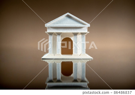 Banking concept. Paper bank building model reflected on table. 86486837