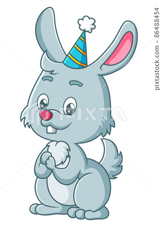 The happy rabbit is wearing the birthday hat 86488454