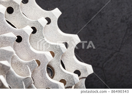 Bicycle road cassette close-up on a black background 86490343