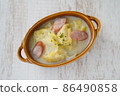 Delicious Chinese cabbage and sausage in cream in the cold winter 86490858