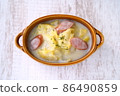 Delicious Chinese cabbage and sausage in cream in the cold winter 86490859