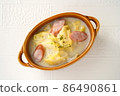 Delicious Chinese cabbage and sausage in cream in the cold winter 86490861