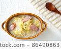 Delicious Chinese cabbage and sausage in cream in the cold winter 86490863
