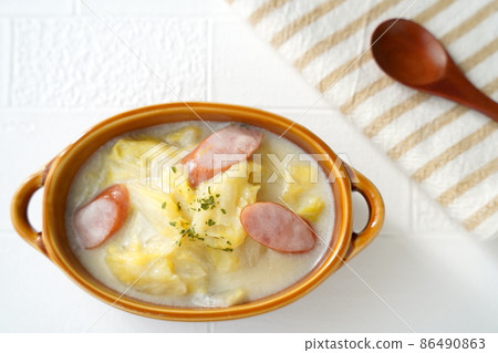 Delicious Chinese cabbage and sausage in cream in the cold winter Delicious Chinese cabbage and sausage in cream in the cold winter 86490863
