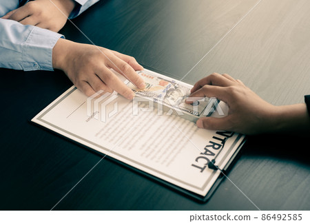 Corruption. Businessmen make an agreement with the money proposed his partner to bribe in the office and make a contract under an agreement. Illegal money fraud The concept of bribery and corruption 86492585