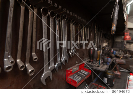 A set of tools in the real auto repair shop. A set of tools in the real auto repair shop. 86494673