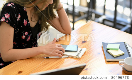 Close-up image, An asian female using smartphone Close-up image, An asian female using smartphone 86496778