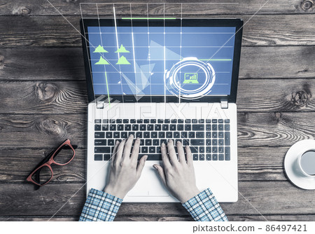 Business workplace with laptop device coffee cup and media graphs and diagrams 86497421