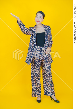 Portrait beautiful young asian woman smile with action Portrait beautiful young asian woman smile with action 86497615